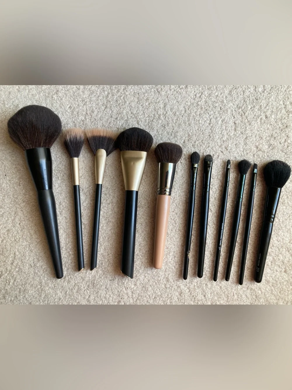 Assorted set of used 11 makeup brushes including Sephora, sonia kashuk and elf